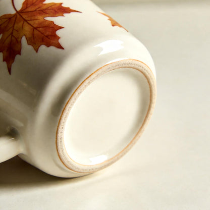 Fall Maple Leaf Ceramic Mug – Cream Coffee Cup with Red, Orange & Golden Autumn Artwork for Cozy Mornings, Reading Corners & Seasonal Gifting