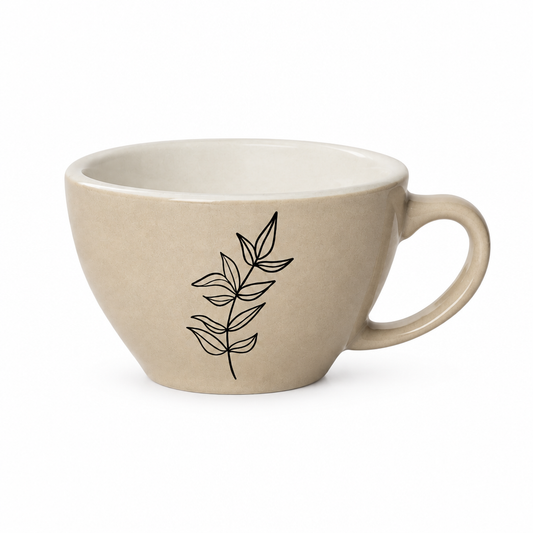 Beige wide-bowl coffee cup with black leaf line art on white background